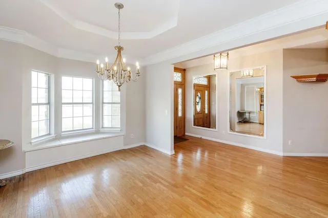 a view of livingroom with window and wooden floor