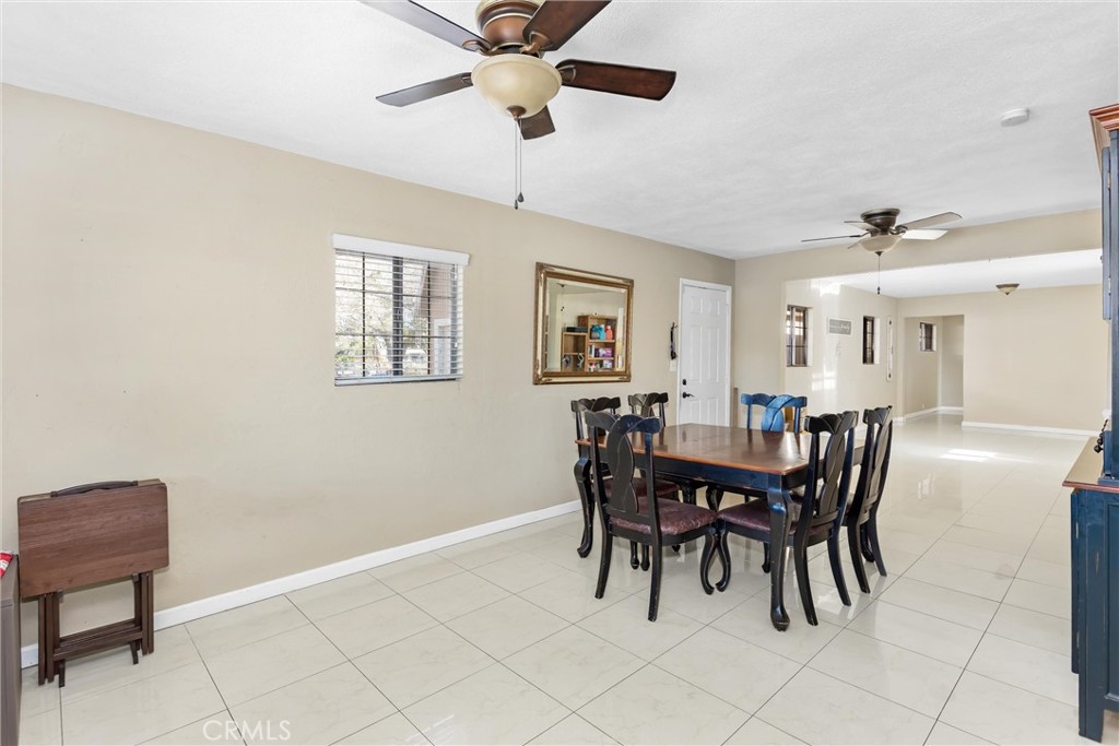13447 Iroquois Road Apple Valley, CA 92308 - Photo 12 of 45 a view of a dining room with furniture