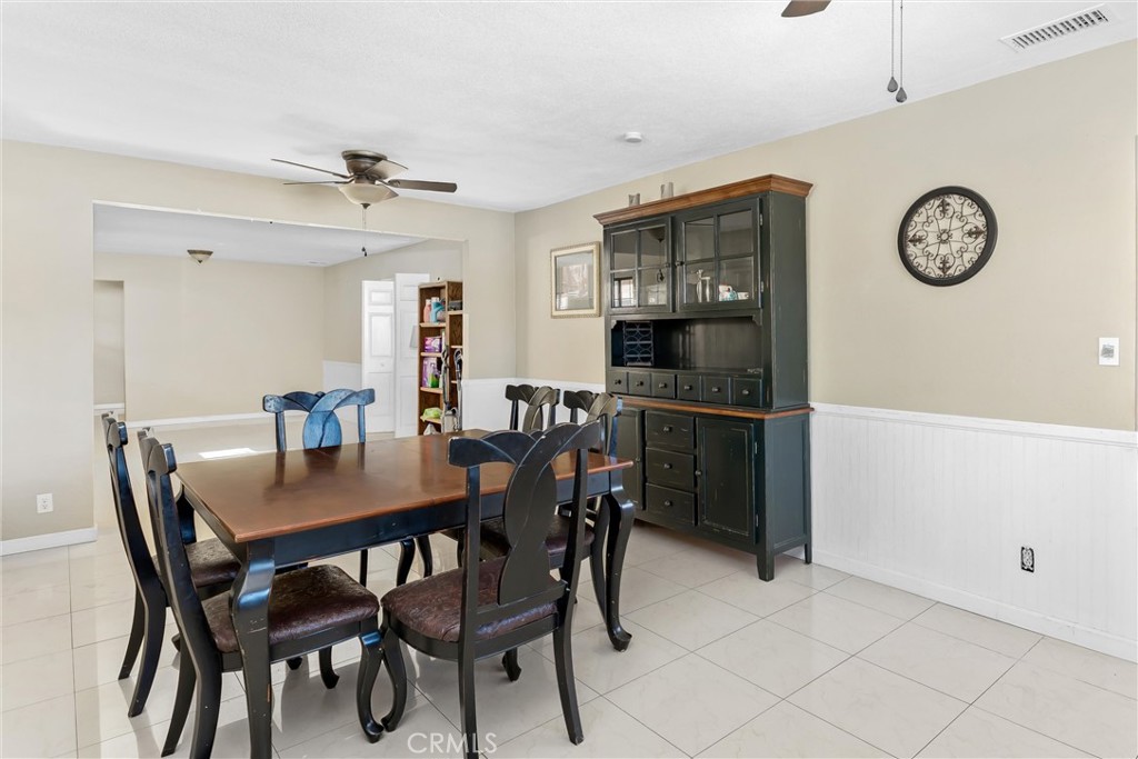 13447 Iroquois Road Apple Valley, CA 92308 - Photo 13 of 45 a view of a dining room with furniture