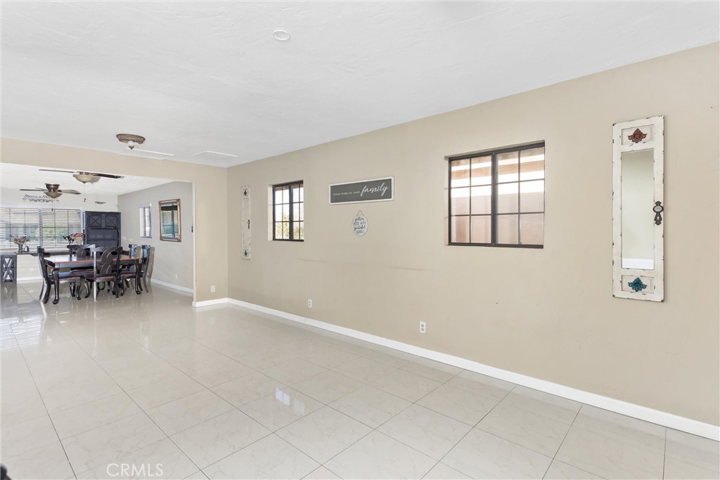 13447 Iroquois Road Apple Valley, CA 92308 - Photo 16 of 45 a view of a livingroom with furniture and workspace