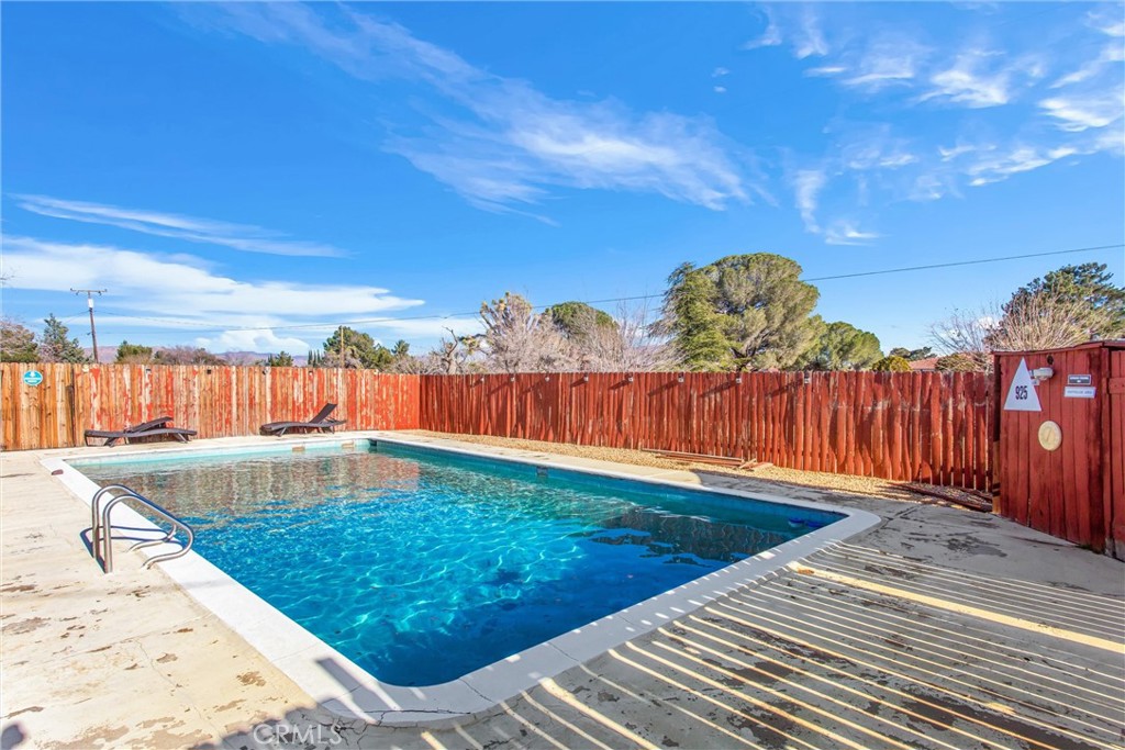 13447 Iroquois Road Apple Valley, CA 92308 - Photo 30 of 45 a view of a backyard