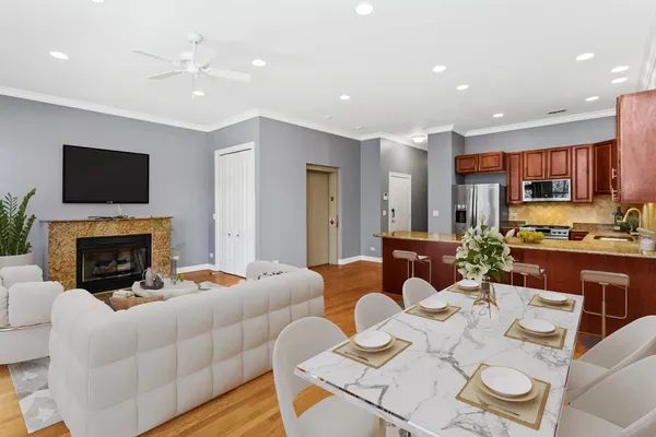 a living room with furniture fireplace and a flat screen tv