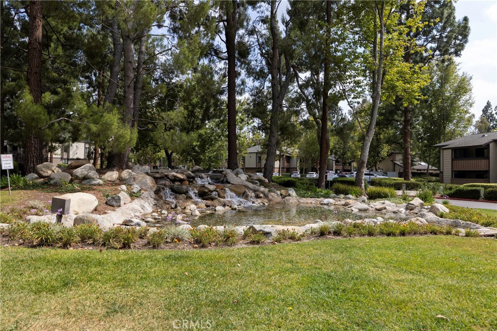 20702 El Toro Road, Unit 178 Lake Forest, CA 92630 - Photo 28 of 30 a view of a backyard with trees
