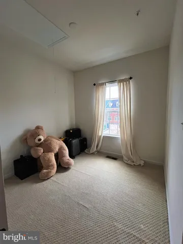 a room with toys and a window