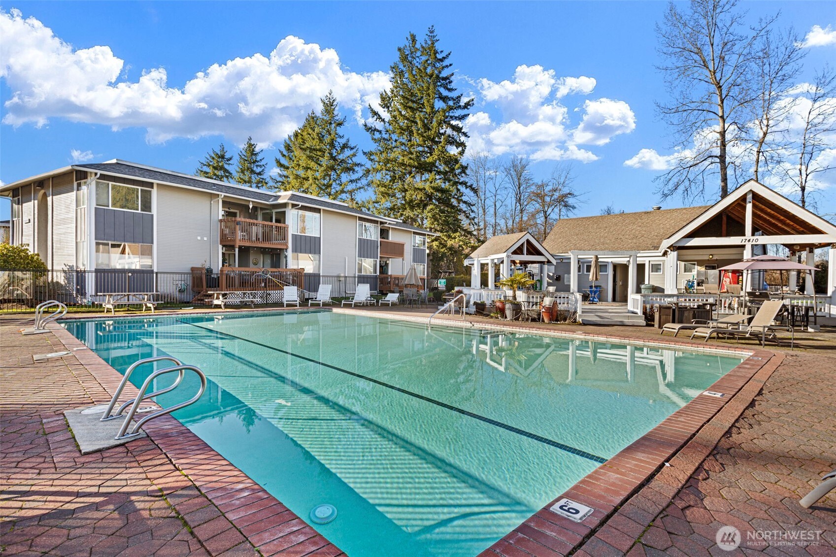 17301 Northeast 45th Street, Unit 87 Redmond, WA 98052 - Photo 17 of 20 a aerial view of a house with swimming pool and porch
