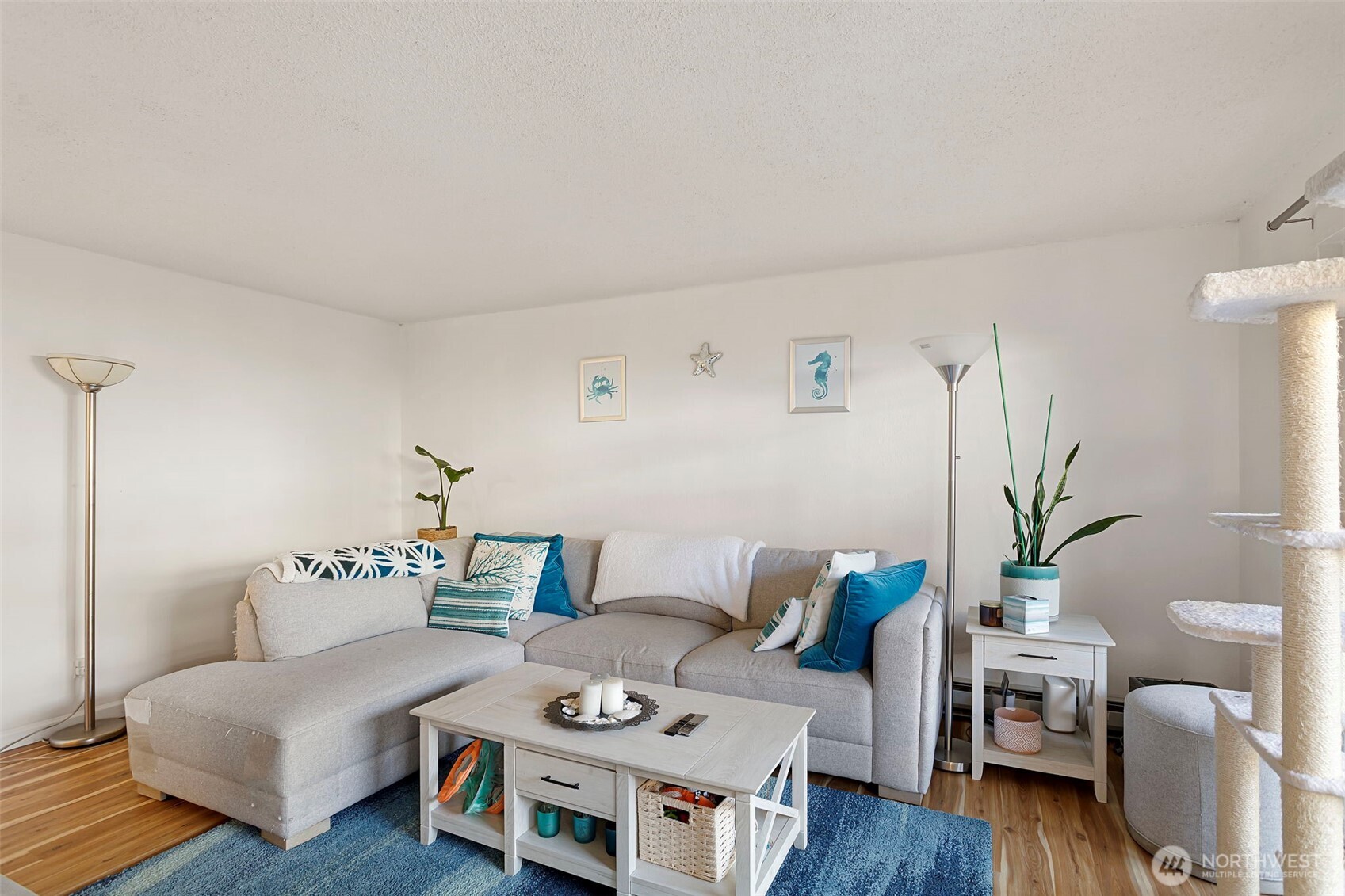 17301 Northeast 45th Street, Unit 87 Redmond, WA 98052 - Photo 3 of 20 a living room with furniture and wooden floor