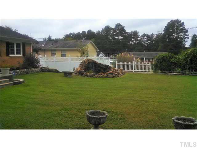 313 Pine Tree Road Oxford, NC 27565 - Photo 16 of 17 Landscaping galore!