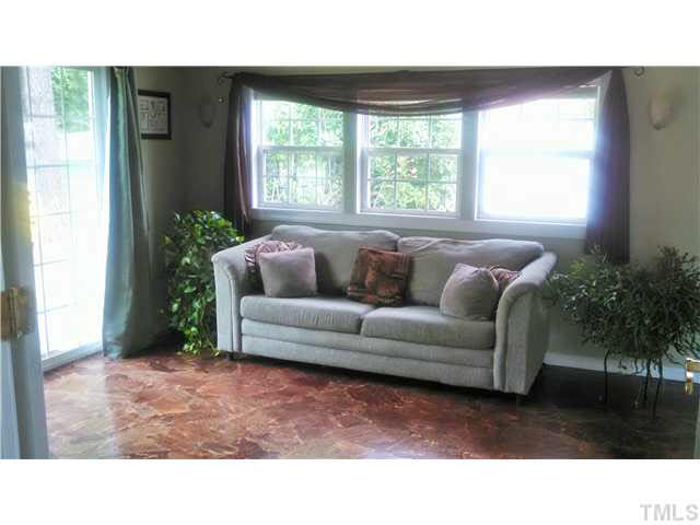 313 Pine Tree Road Oxford, NC 27565 - Photo 4 of 17 One of a kind sunroom/family room...amazing flooring and ceiling!