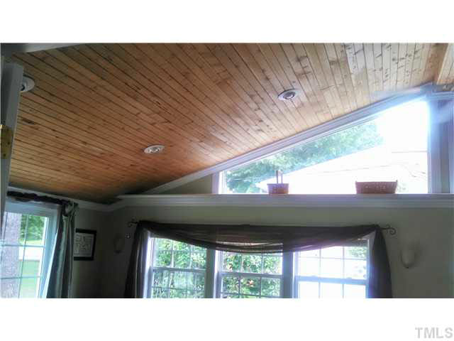 313 Pine Tree Road Oxford, NC 27565 - Photo 6 of 17 Closer look at custom cedar ceilings and windows