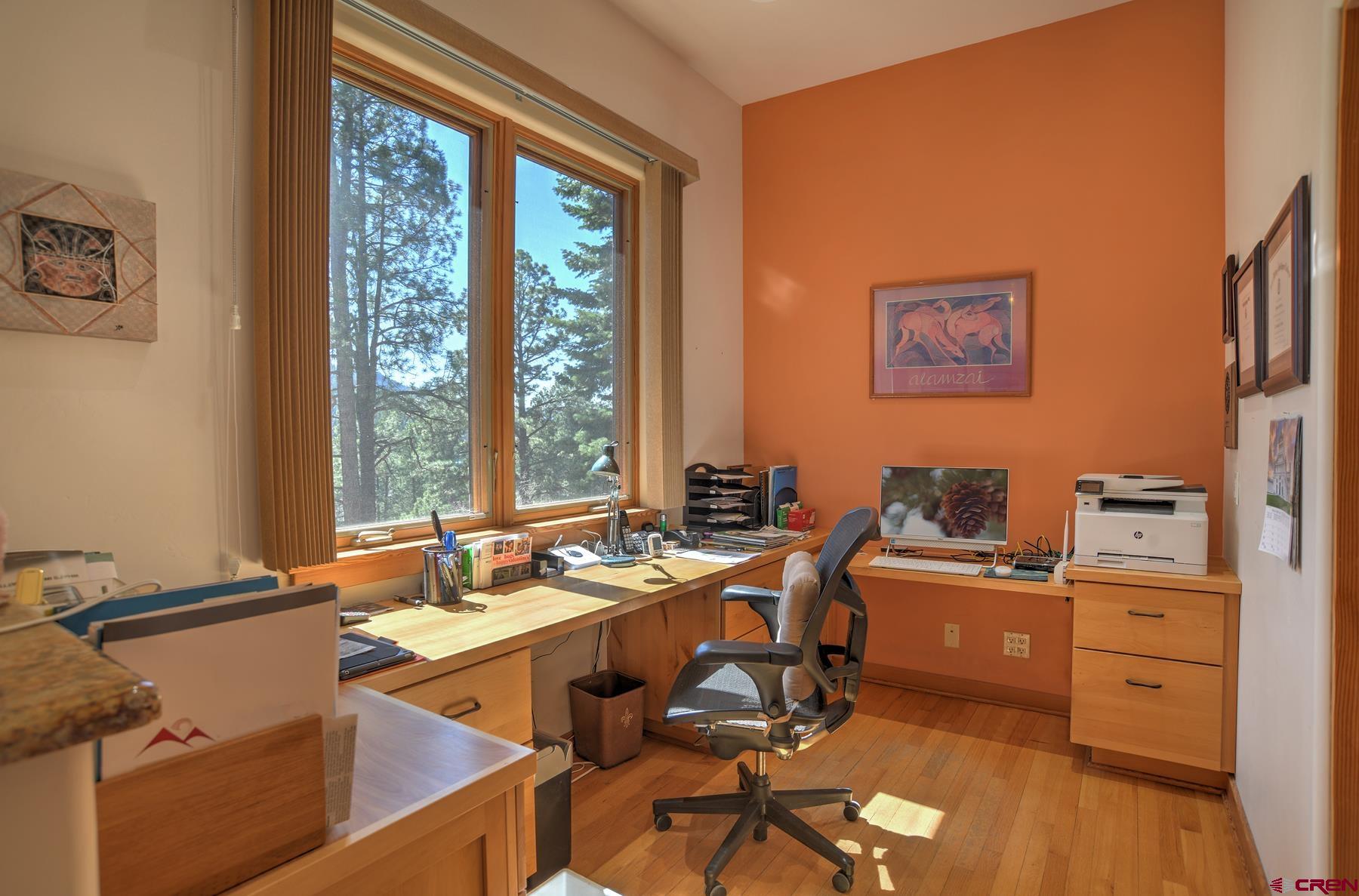 95 Puma Place Durango, CO 81301 - Photo 11 of 45 a view of a workspace with furniture and a window