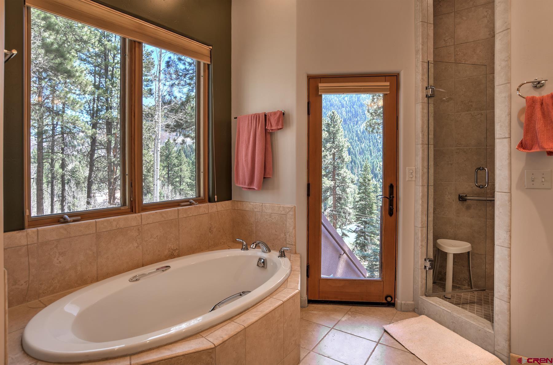 95 Puma Place Durango, CO 81301 - Photo 19 of 45 a bathroom with a bathtub and shower