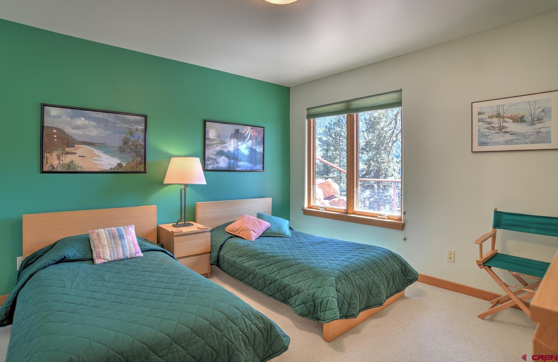 95 Puma Place Durango, CO 81301 - Photo 31 of 45 a bedroom with bed and a window