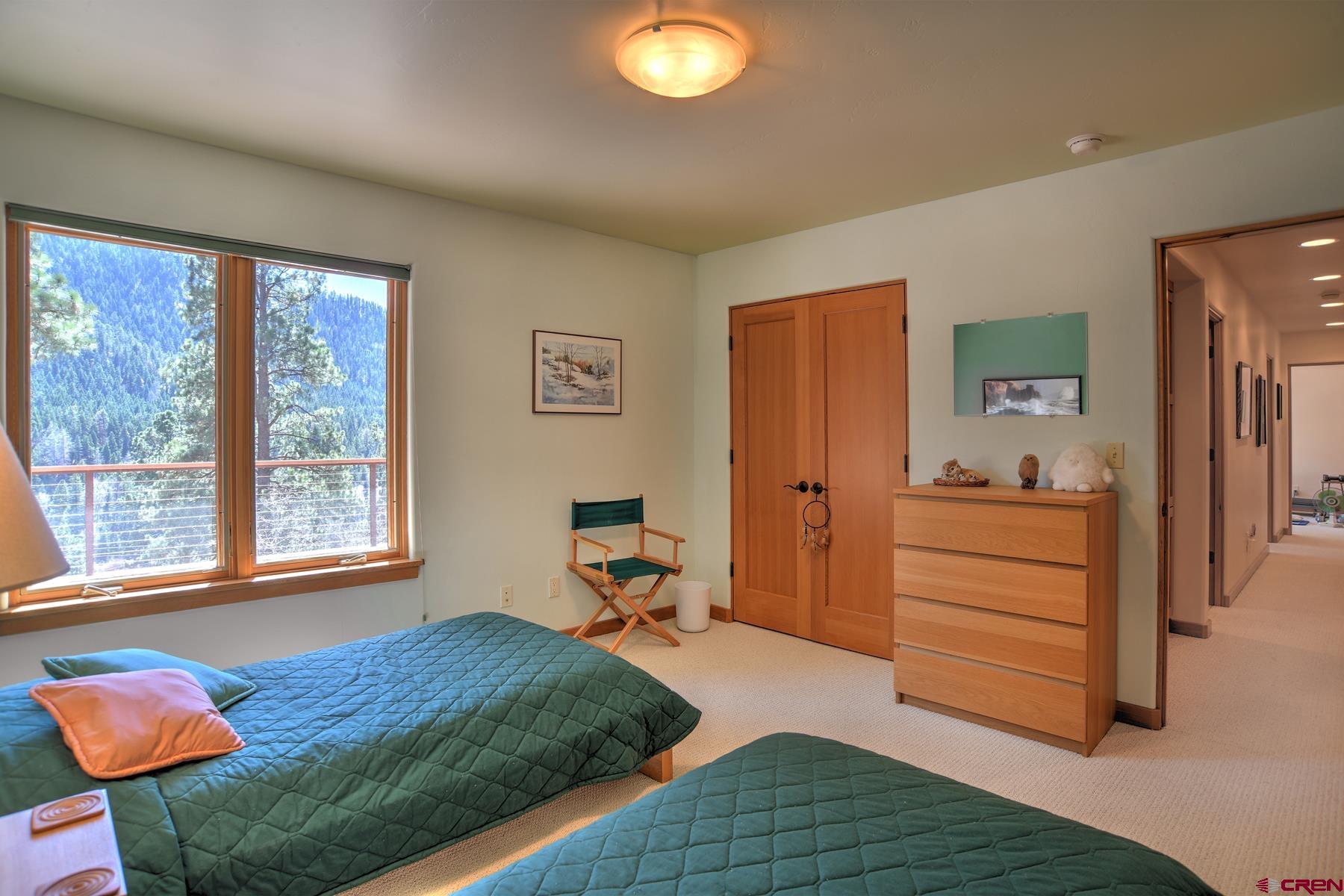 95 Puma Place Durango, CO 81301 - Photo 32 of 45 a bed room with a bed and a window