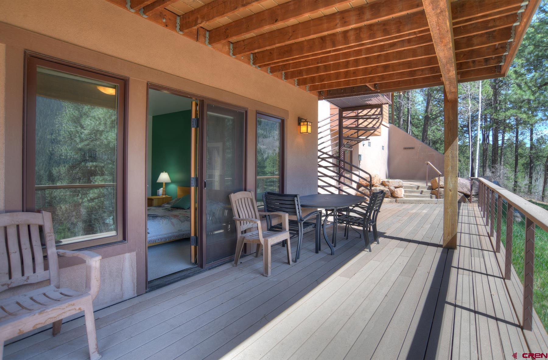 95 Puma Place Durango, CO 81301 - Photo 38 of 45 a view of a patio with chairs and wooden floor