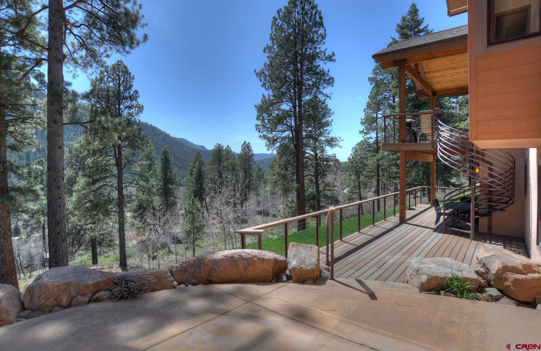 95 Puma Place Durango, CO 81301 - Photo 40 of 45 a view of a backyard with plants and trees