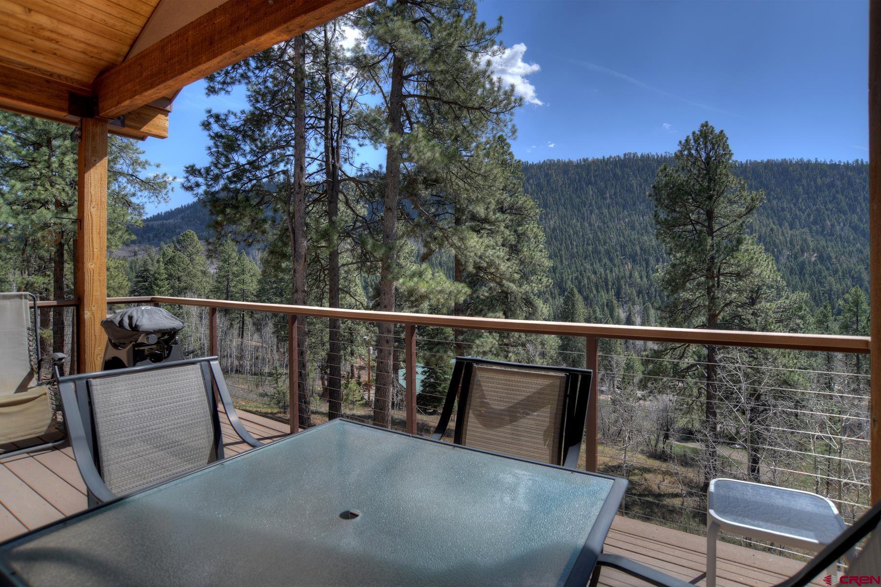 95 Puma Place Durango, CO 81301 - Photo 43 of 45 a view of a balcony with mountain view and wooden floor