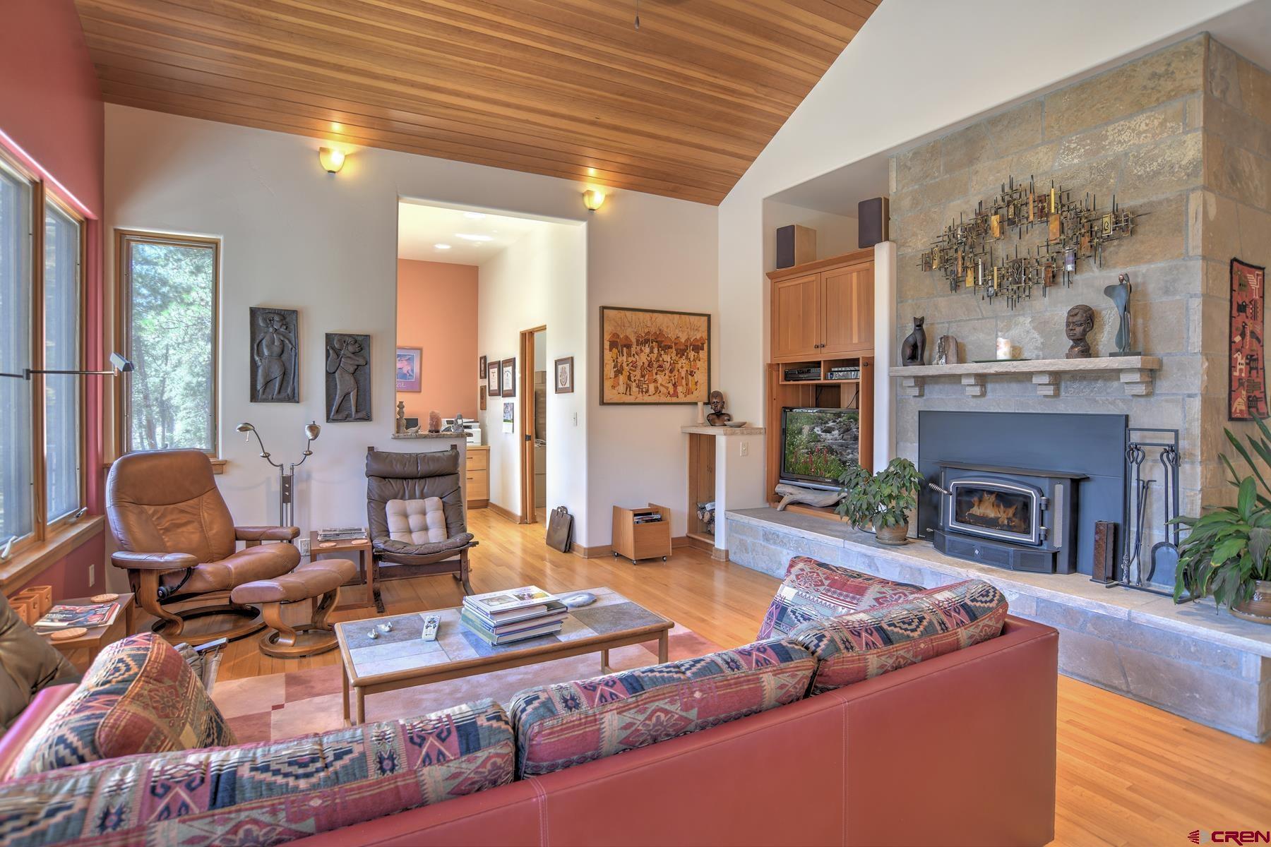 95 Puma Place Durango, CO 81301 - Photo 8 of 45 a living room with furniture and a fireplace