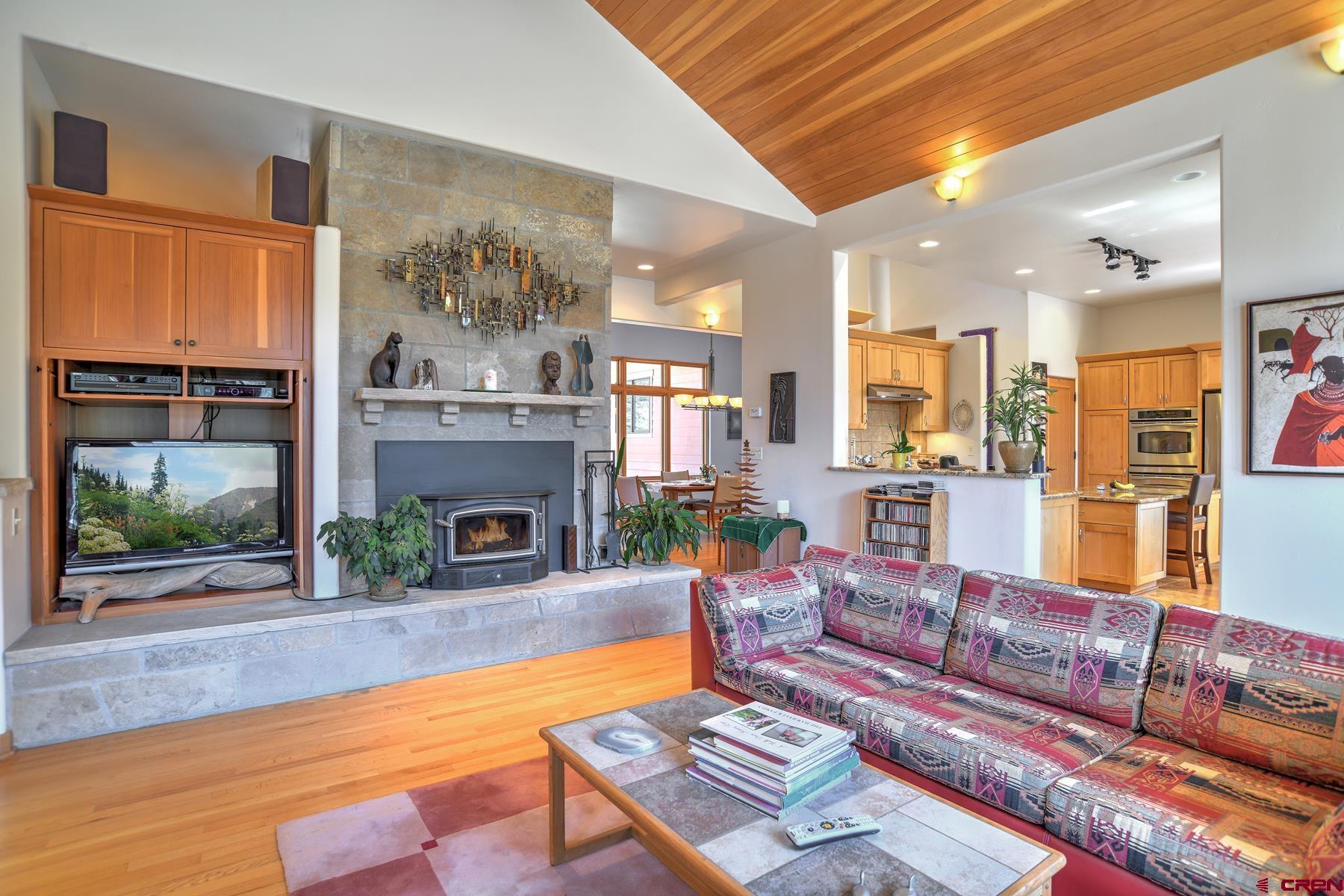 95 Puma Place Durango, CO 81301 - Photo 10 of 45 a living room with furniture and a fireplace