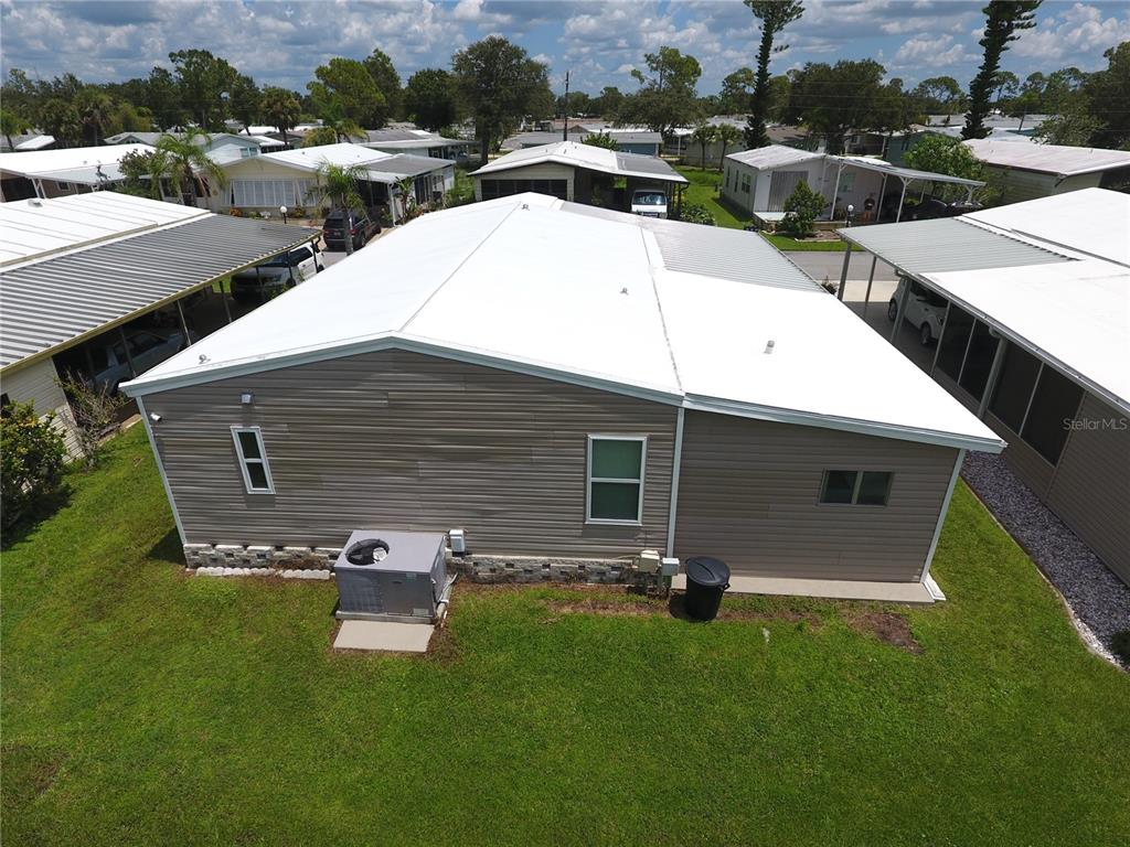 140 Rarotonga Road North Port, FL 34287 - Photo 32 of 42 a view of a house with a yard