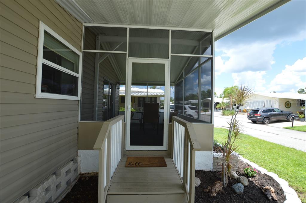 140 Rarotonga Road North Port, FL 34287 - Photo 5 of 42 a view of entryway and patio