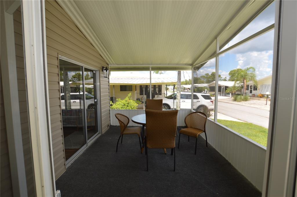 140 Rarotonga Road North Port, FL 34287 - Photo 6 of 42 a view of a dining room with furniture window and outside view