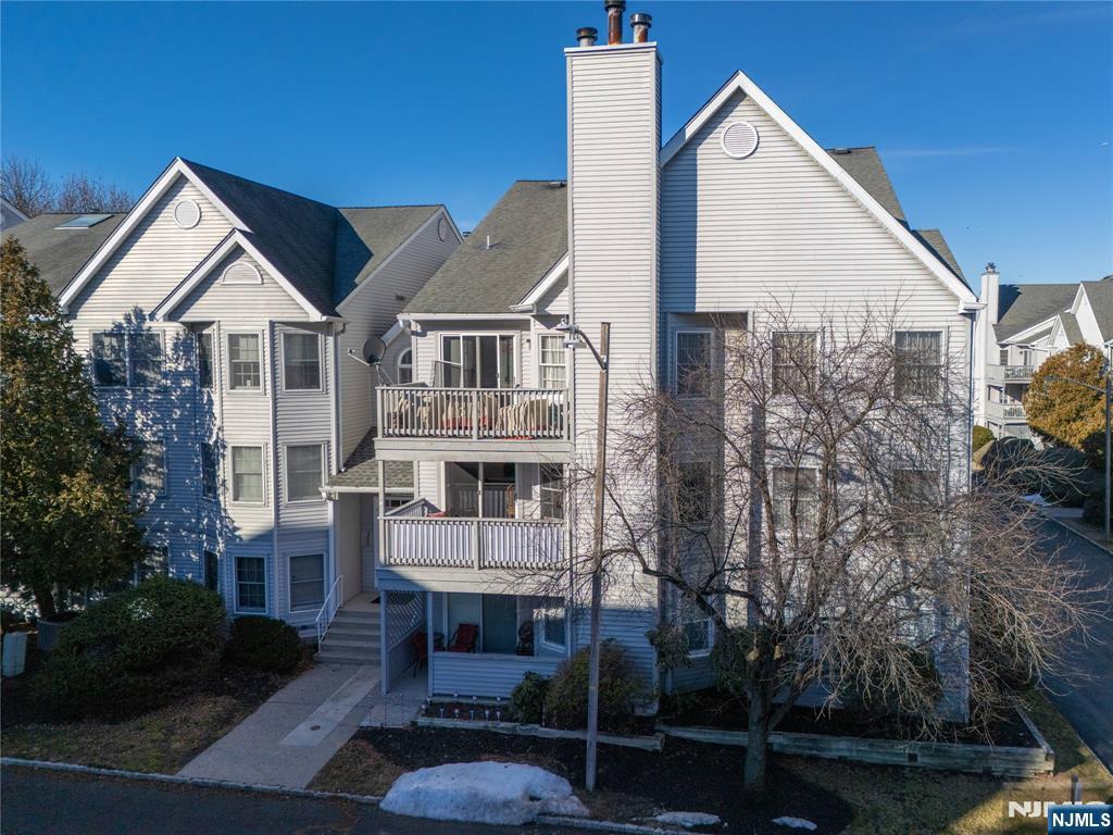 101 Quartz Lane Paterson, NJ 07501 - Photo 1 of 34 a view of multiple houses with a yard