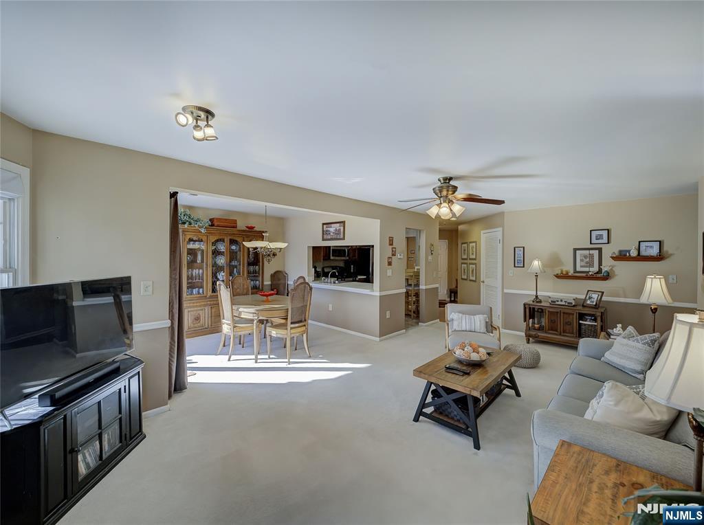 101 Quartz Lane Paterson, NJ 07501 - Photo 11 of 34 a living room with furniture and a flat screen tv