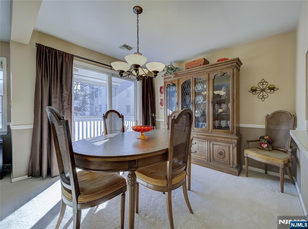 101 Quartz Lane Paterson, NJ 07501 - Photo 12 of 34 a dining room with furniture and window