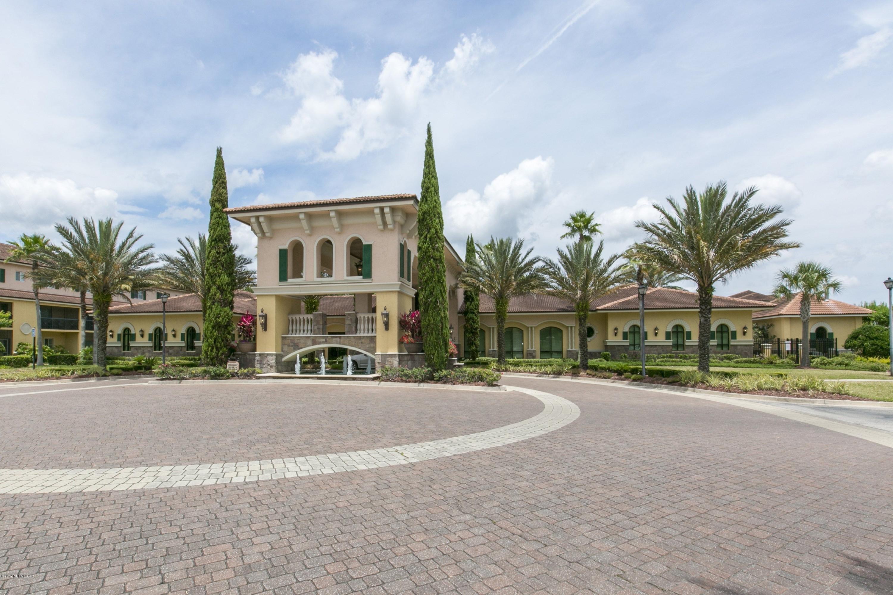 9745 Touchton Road, Unit 1828 Jacksonville, FL 32246 - Photo 2 of 26 a front view of multiple house with palm trees