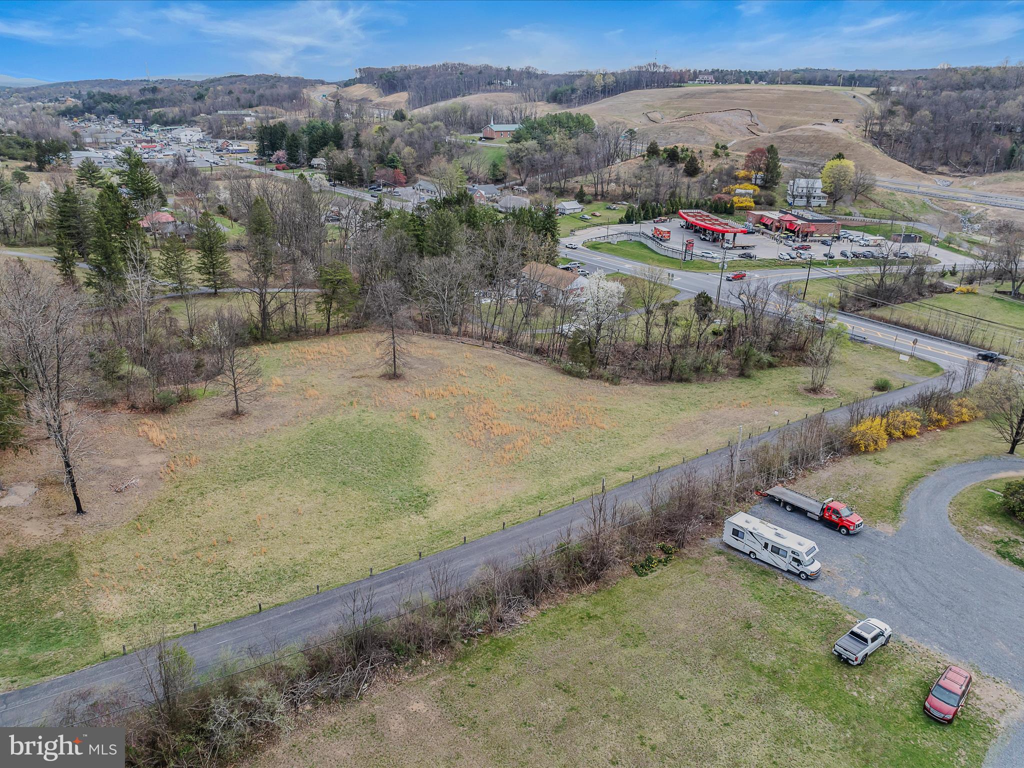 2218 Valley Road Berkeley Springs, WV 25411 - Photo 13 of 32 a view of a town with mountains in the background