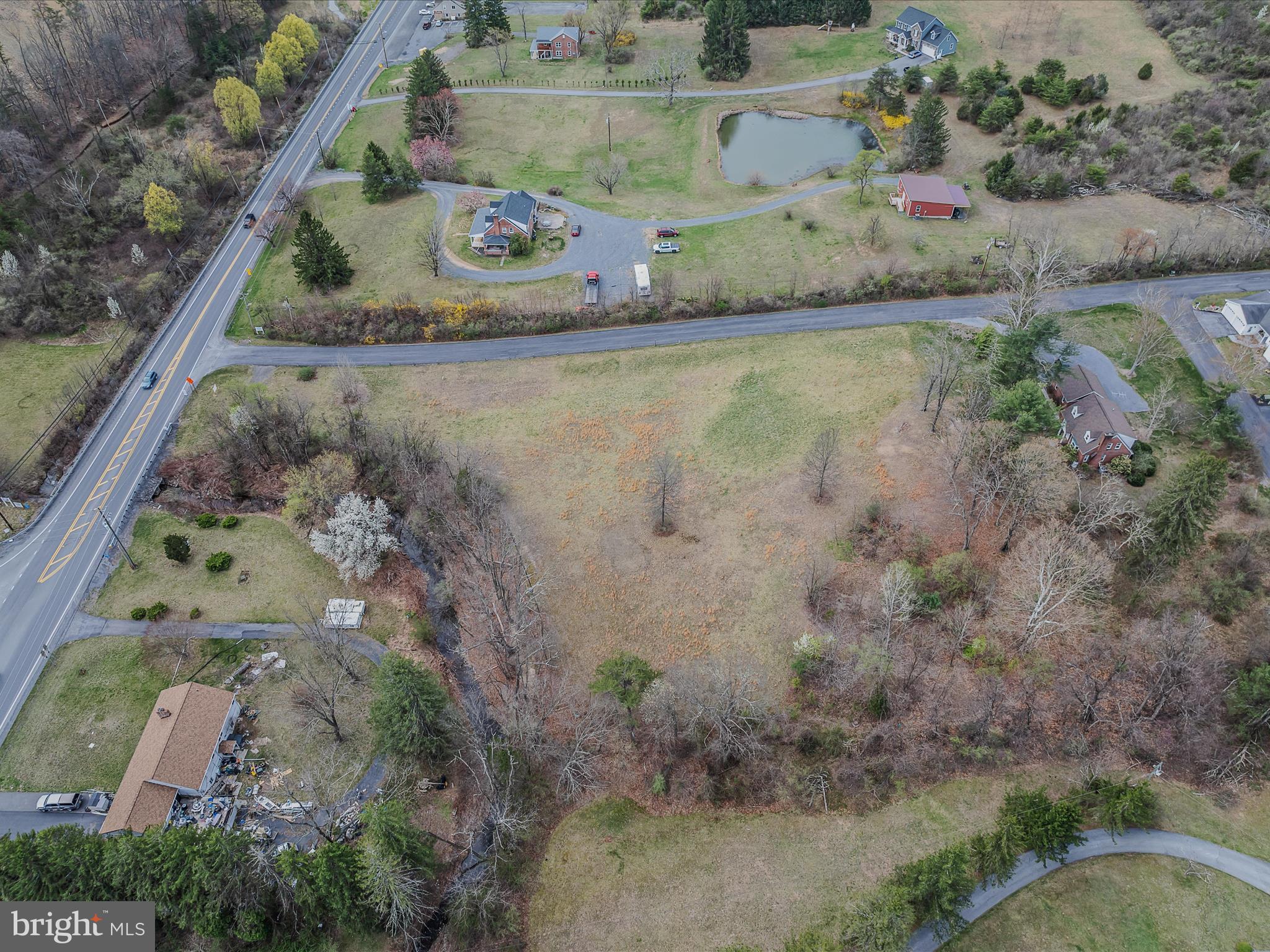 2218 Valley Road Berkeley Springs, WV 25411 - Photo 21 of 32 an aerial view of residential houses with outdoor space