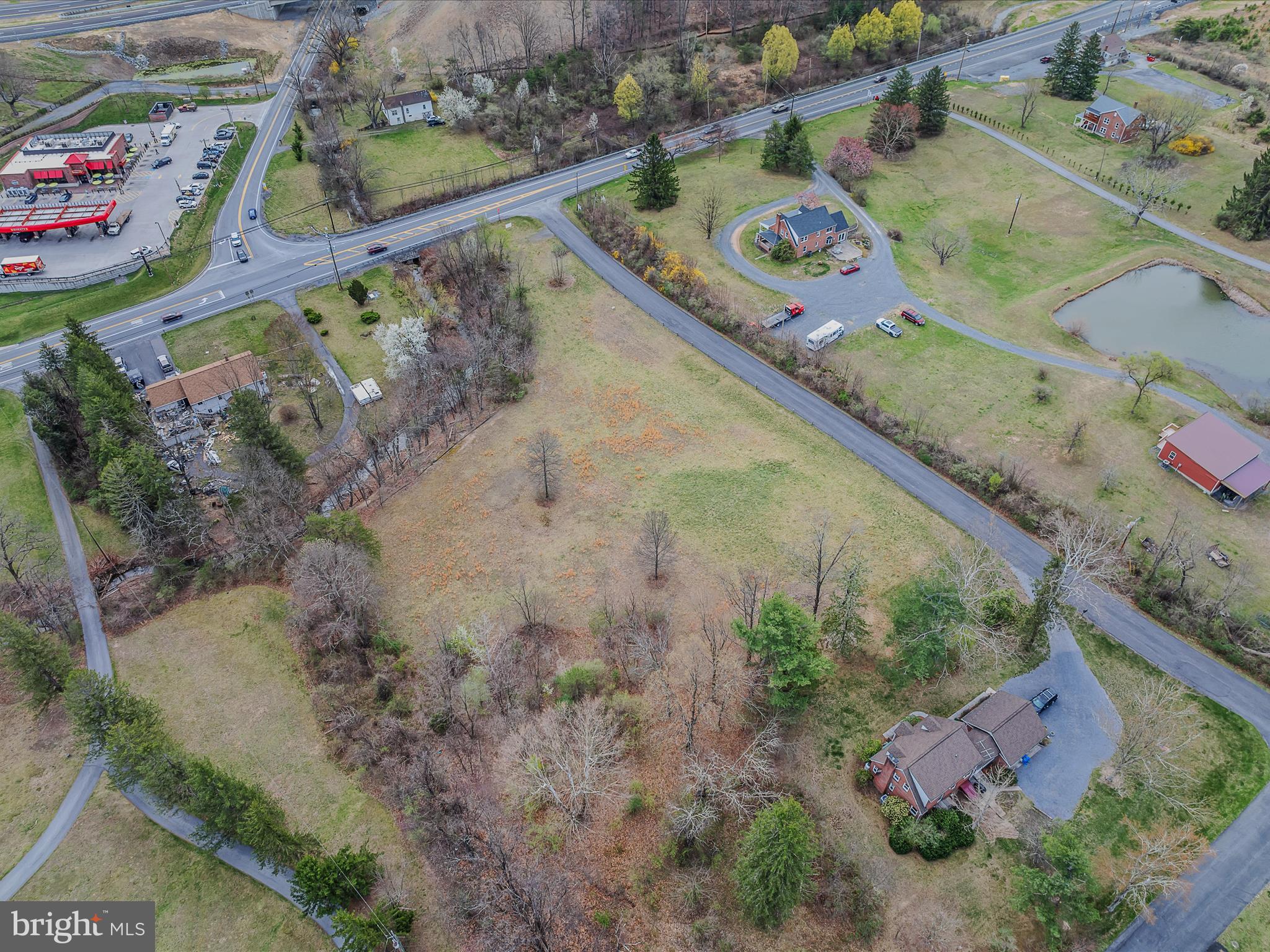 2218 Valley Road Berkeley Springs, WV 25411 - Photo 22 of 32 a view of entryway with a garden