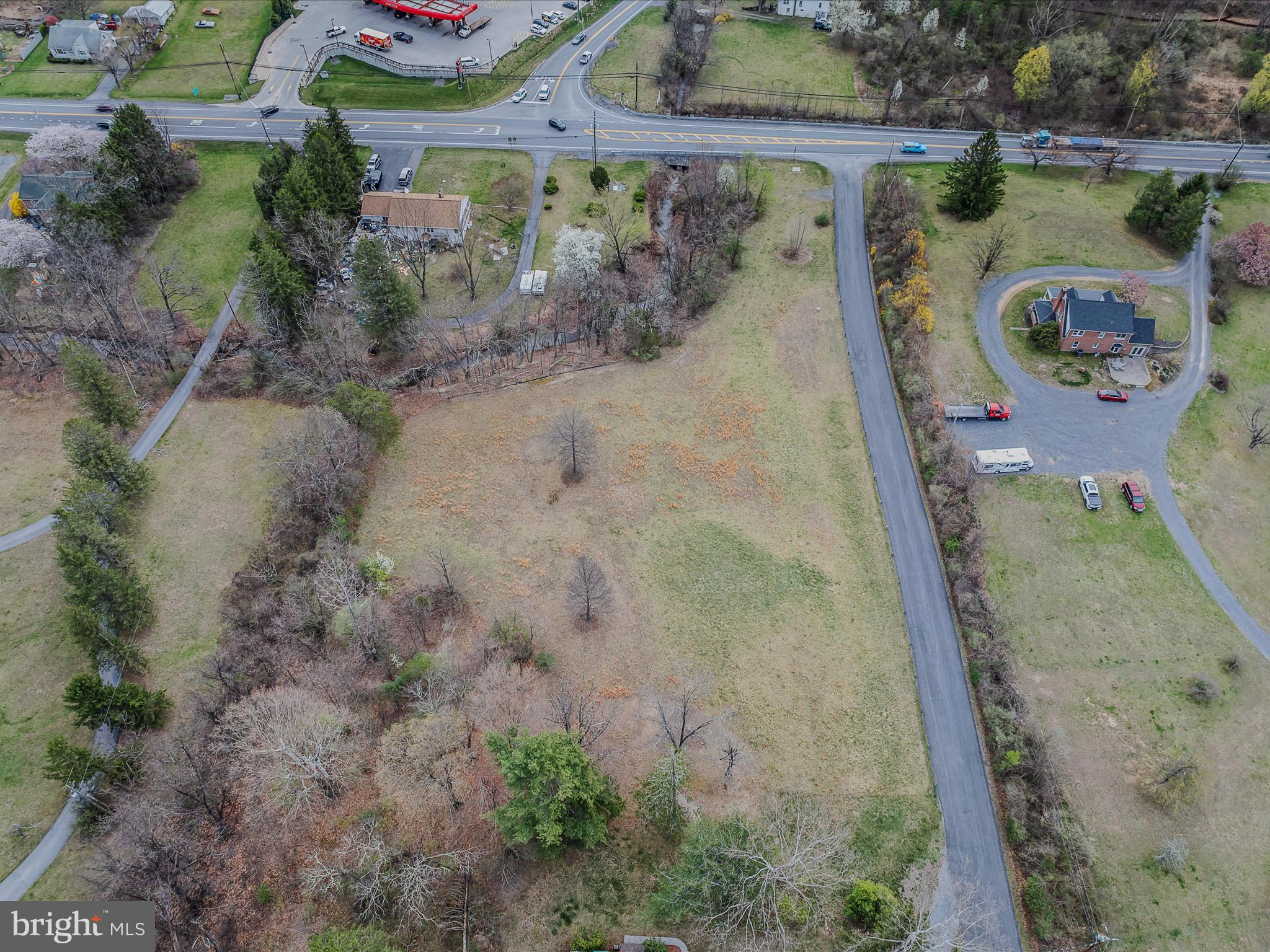 2218 Valley Road Berkeley Springs, WV 25411 - Photo 23 of 32 an aerial view of a house with a yard