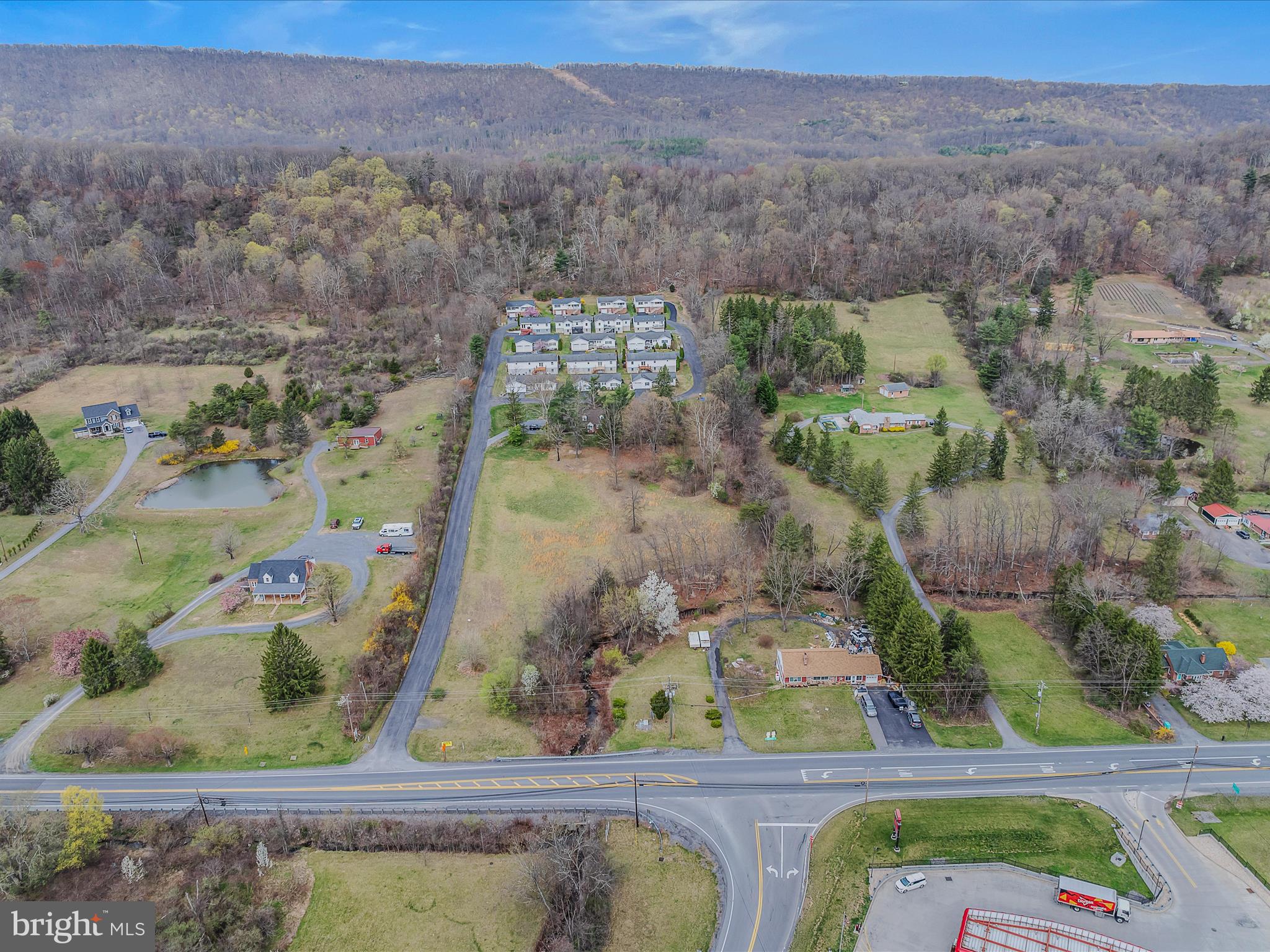 2218 Valley Road Berkeley Springs, WV 25411 - Photo 27 of 32 an aerial view of a house with a yard