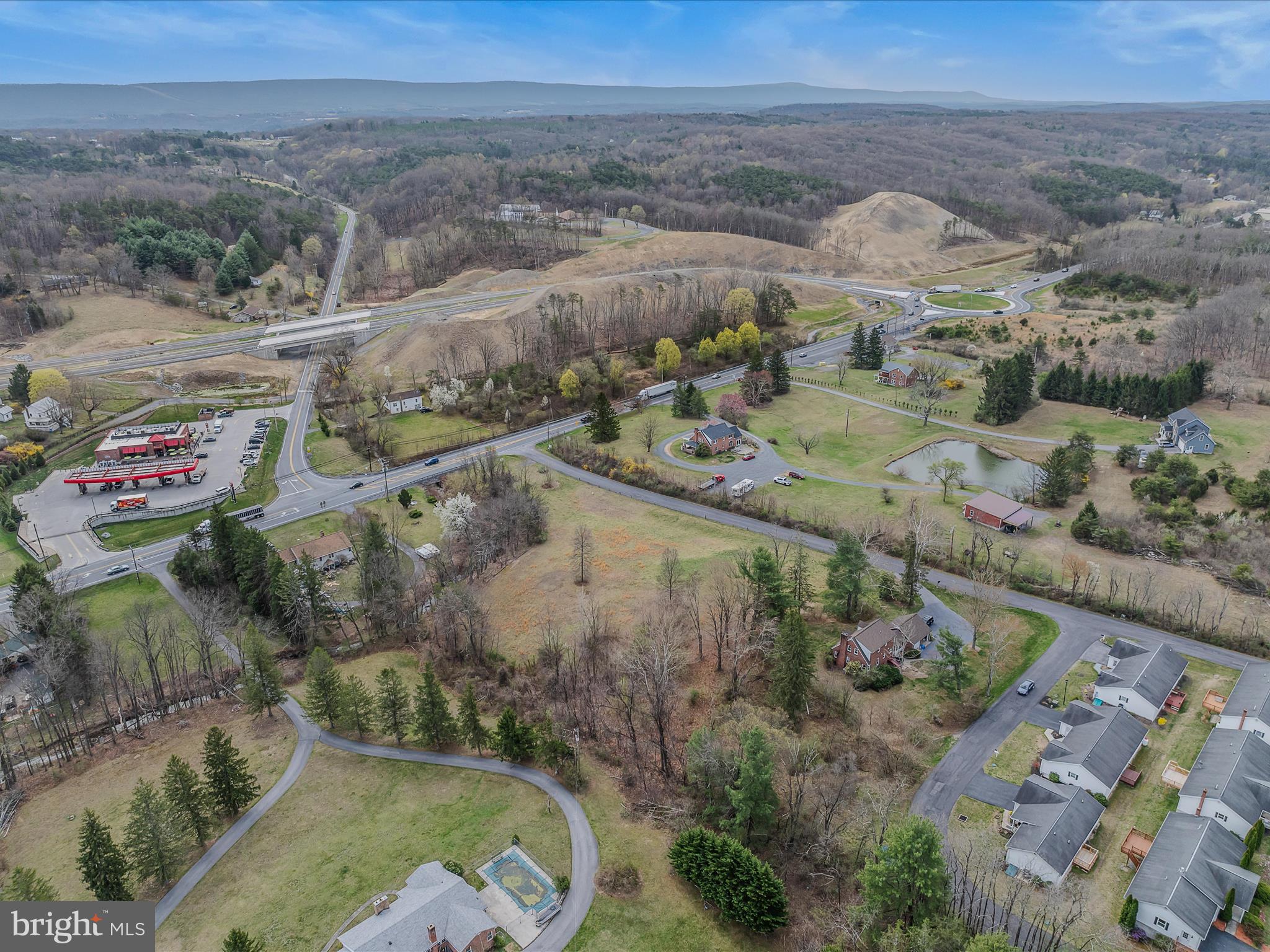 2218 Valley Road Berkeley Springs, WV 25411 - Photo 30 of 32 an aerial view of a house with a yard