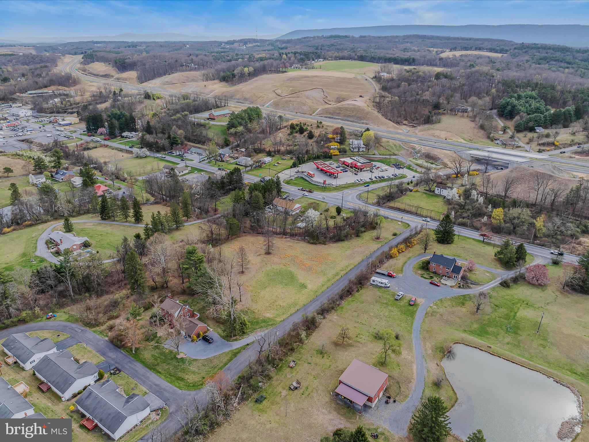 2218 Valley Road Berkeley Springs, WV 25411 - Photo 32 of 32 an aerial view of a house with a yard