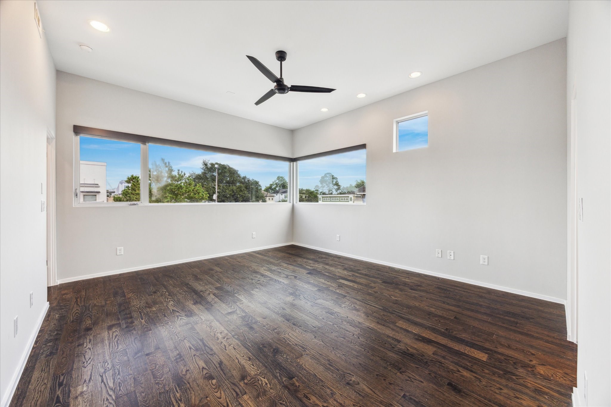 1728 Michigan Street, Unit A Houston, TX 77006 - Photo 18 of 38 a view of empty room with wooden floor and fan