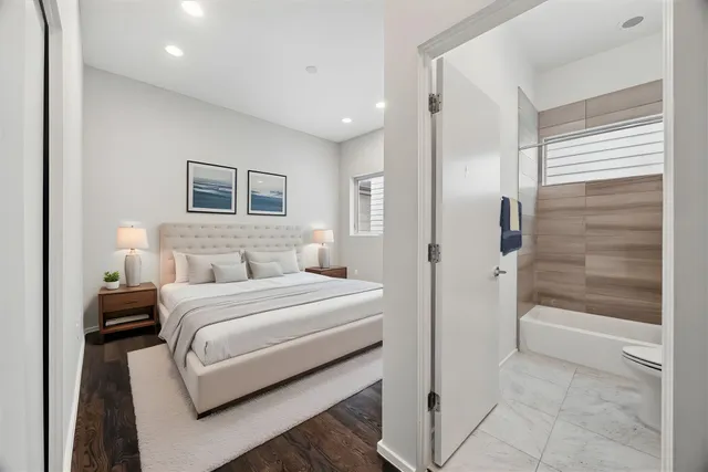 a view of a bathroom with wooden floor