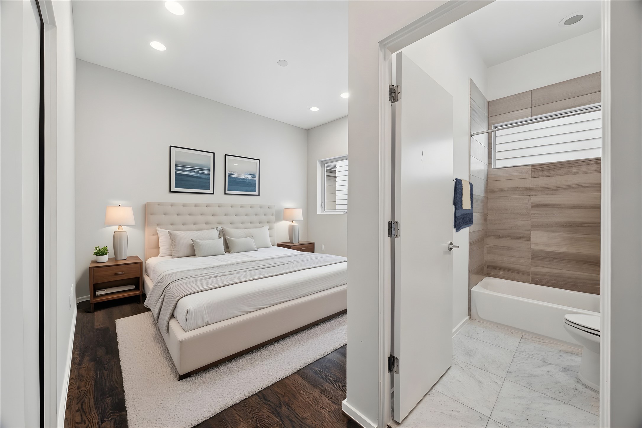 1728 Michigan Street, Unit A Houston, TX 77006 - Photo 22 of 38 a bedroom with a bed and a walk in closet