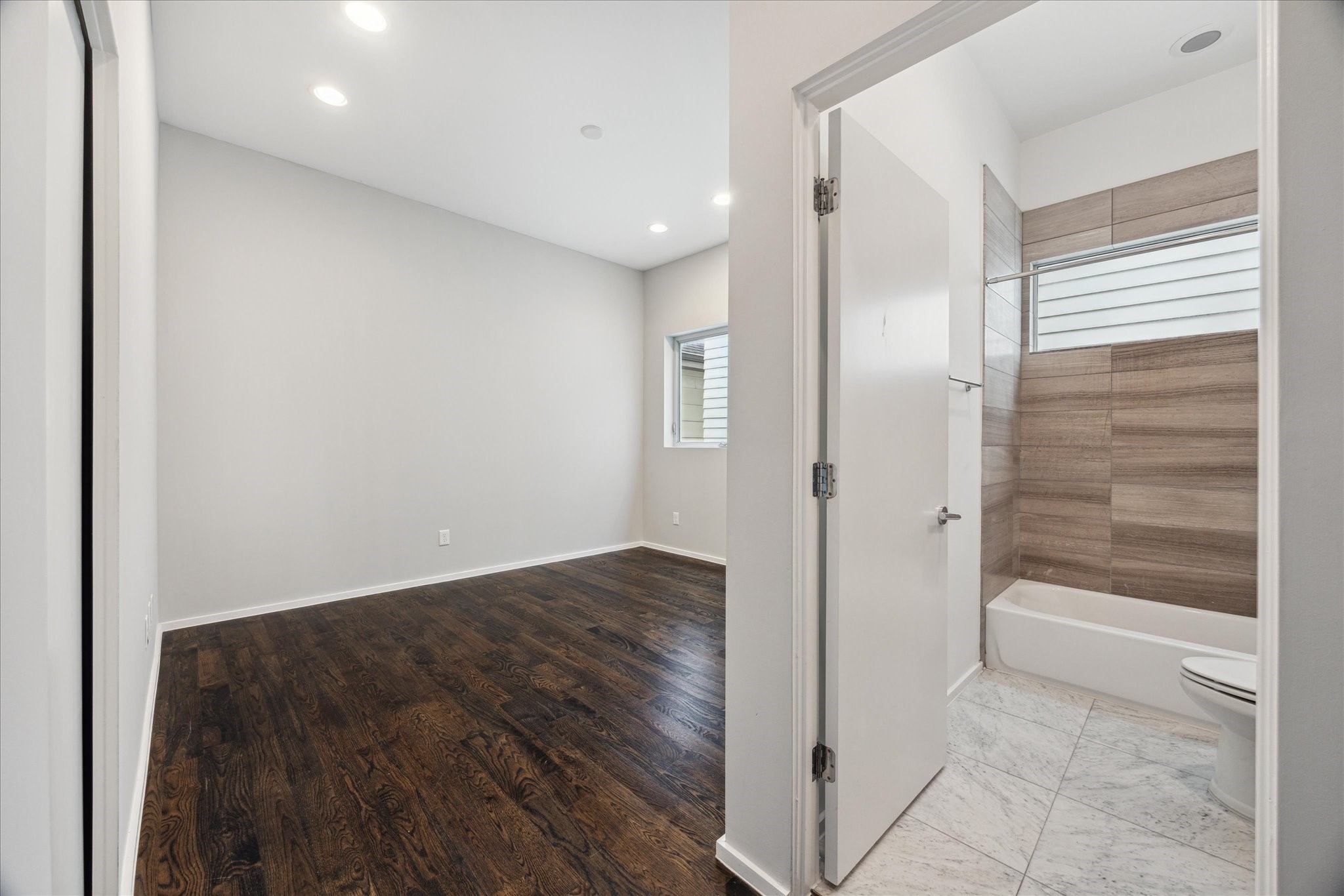 1728 Michigan Street, Unit A Houston, TX 77006 - Photo 23 of 38 a view of a bathroom with wooden floor