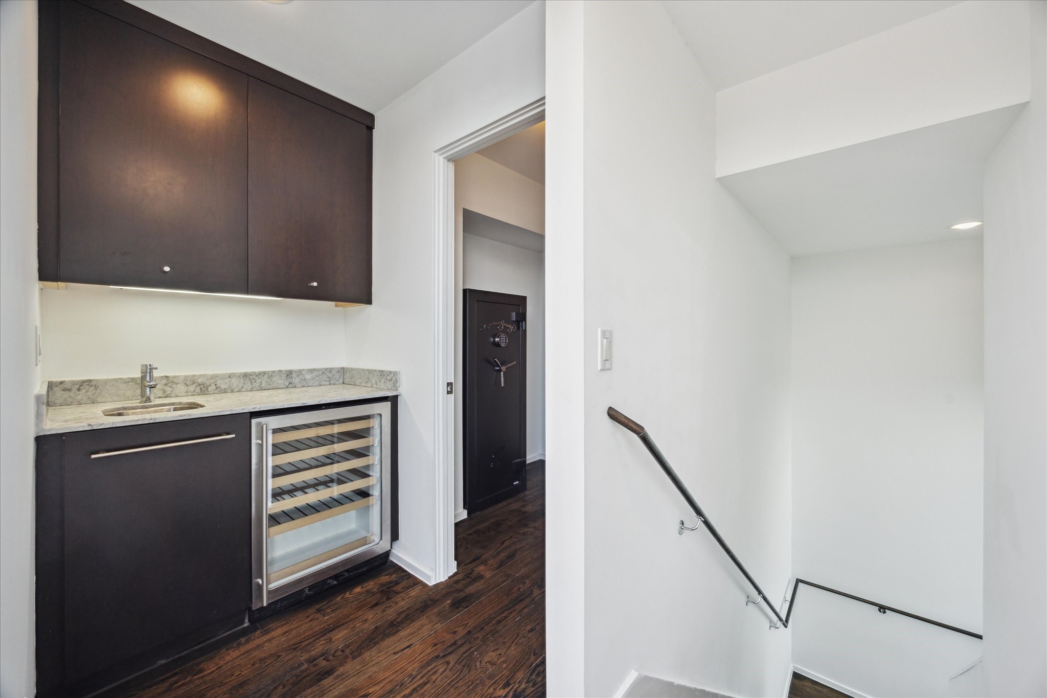 1728 Michigan Street, Unit A Houston, TX 77006 - Photo 28 of 38 a kitchen with granite countertop a stove and a refrigerator with wooden floor