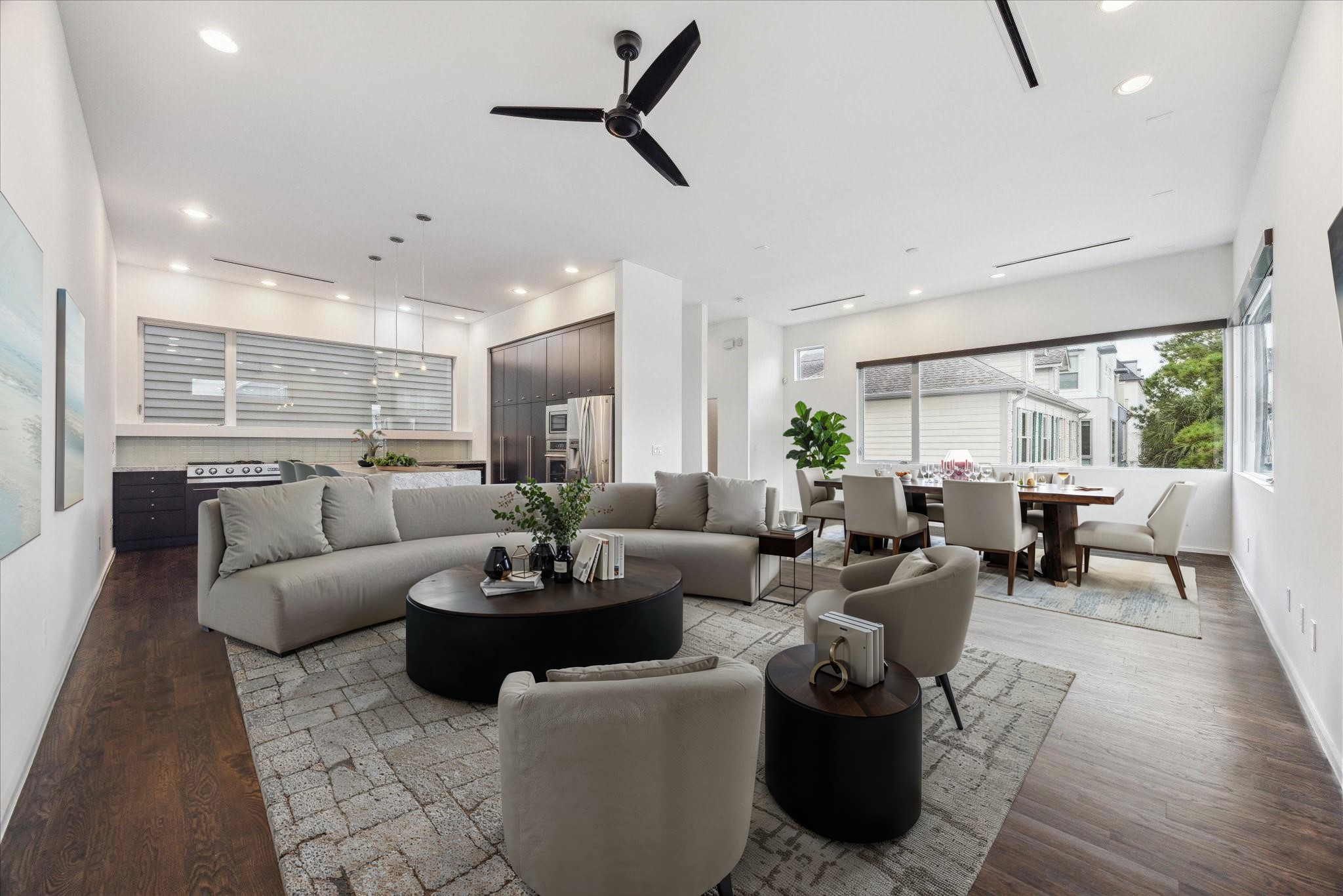 1728 Michigan Street, Unit A Houston, TX 77006 - Photo 6 of 38 a living room with furniture wooden floor and a large window