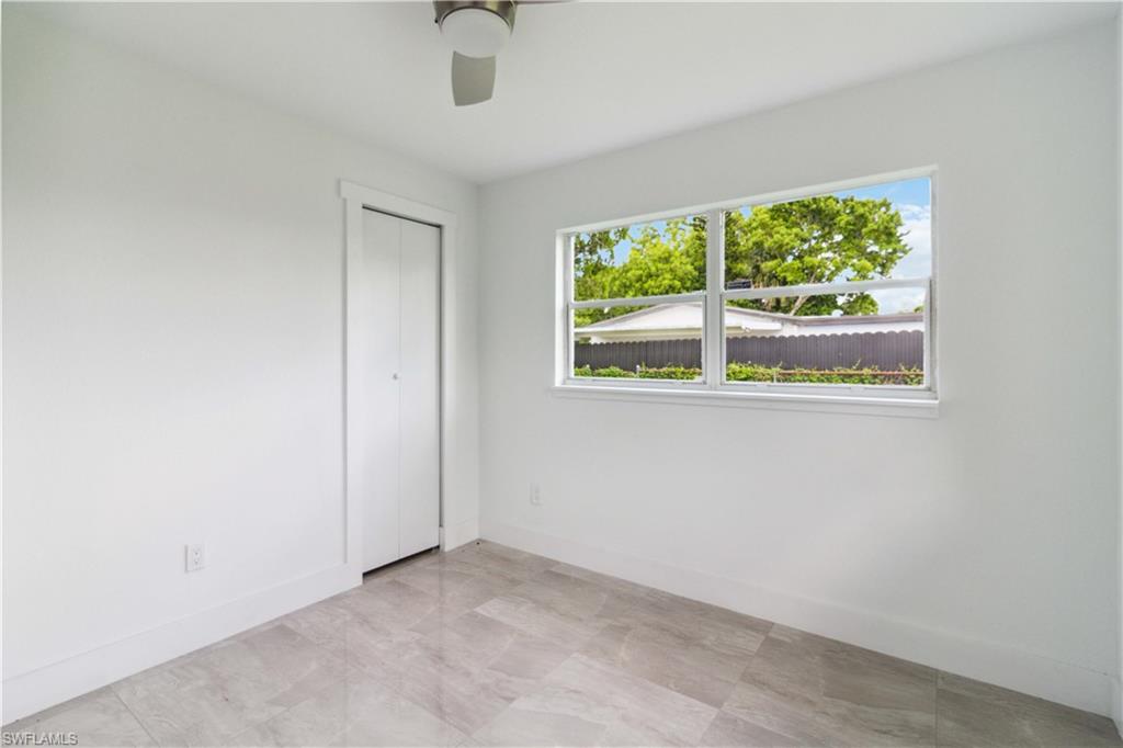1102 East Bougainvillea Road Lehigh Acres, FL 33936 - Photo 22 of 28 an empty room with window