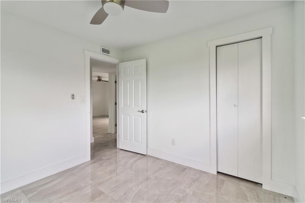 1102 East Bougainvillea Road Lehigh Acres, FL 33936 - Photo 23 of 28 a view of an empty room