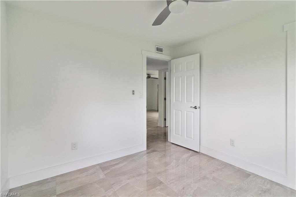 1102 East Bougainvillea Road Lehigh Acres, FL 33936 - Photo 24 of 28 a view of an empty room