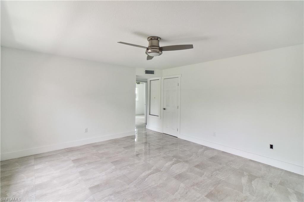 1102 East Bougainvillea Road Lehigh Acres, FL 33936 - Photo 7 of 28 a view of an empty room