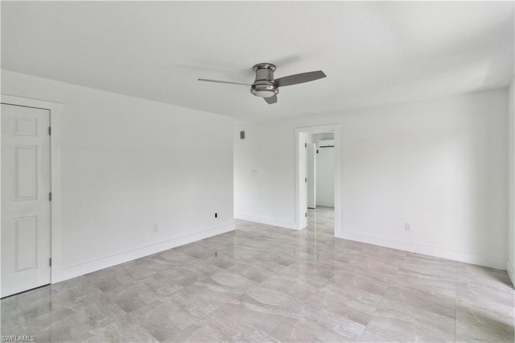 1102 East Bougainvillea Road Lehigh Acres, FL 33936 - Photo 8 of 28 a view of an empty room