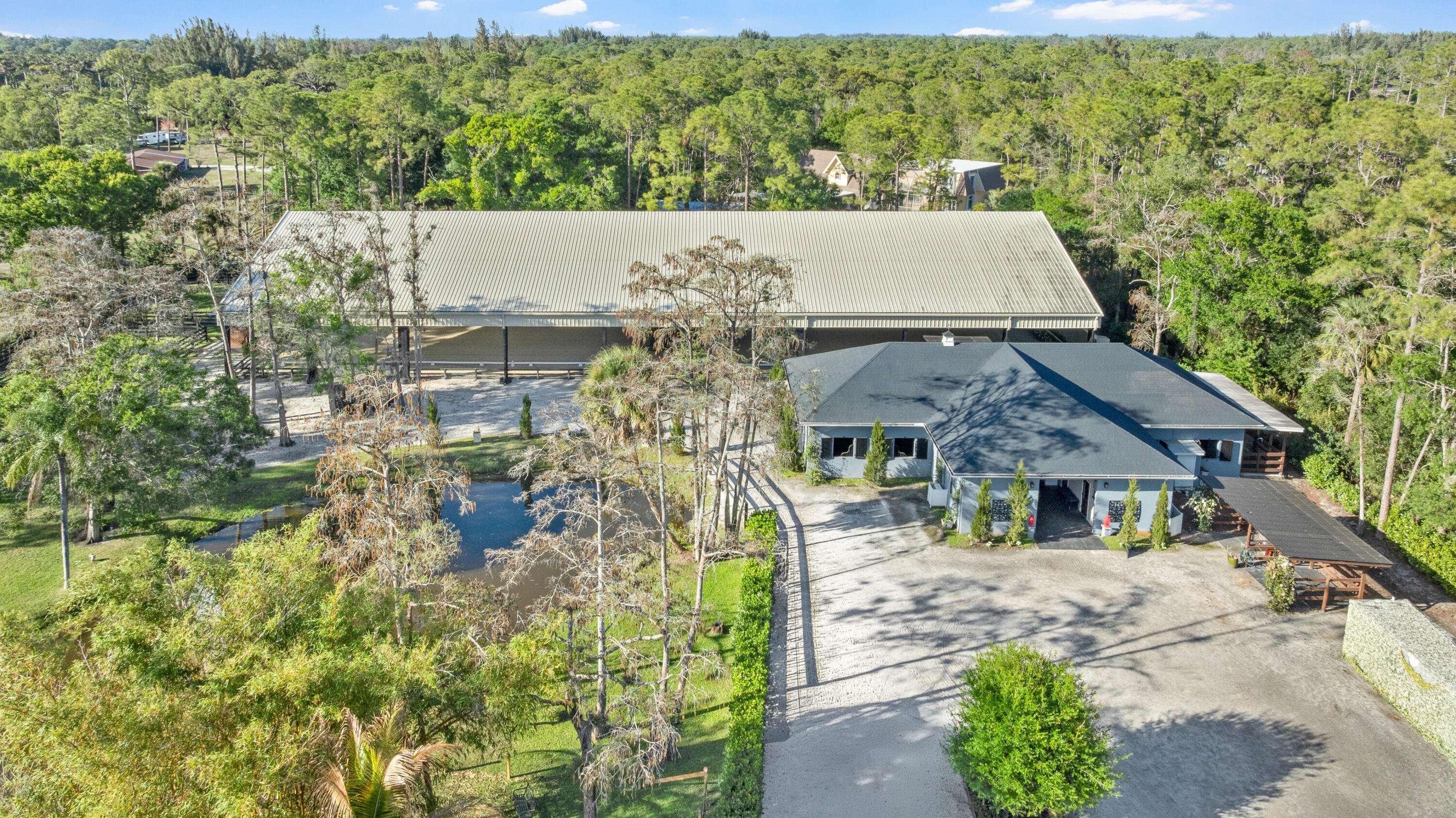15161 Collecting Canal Road Loxahatchee Groves, FL 33470 - Photo 4 of 69 Barn One - 12 stalls