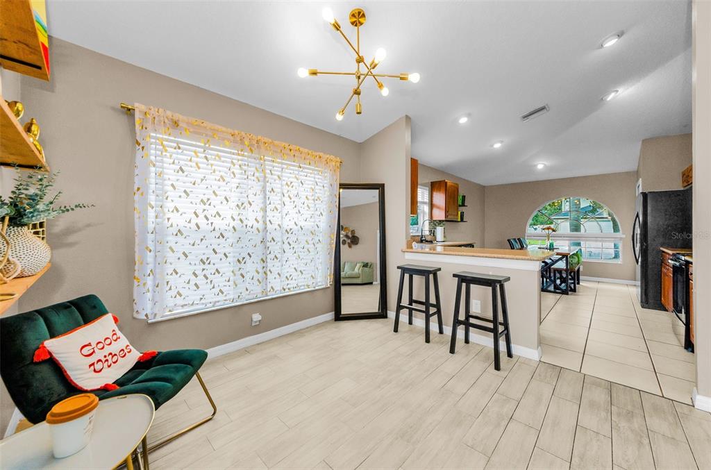 13561 Fladgate Mark Drive Riverview, FL 33579 - Photo 11 of 65 a view of a living room and dining room