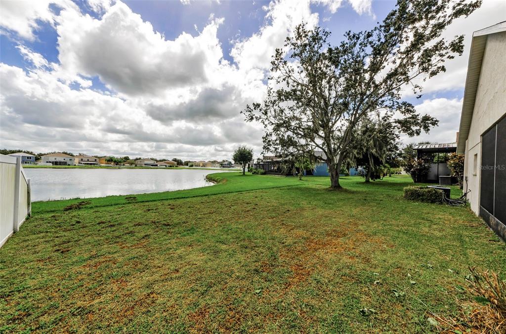 13561 Fladgate Mark Drive Riverview, FL 33579 - Photo 39 of 65 a view of a garden with houses
